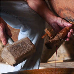 man doing the wood hammer opening